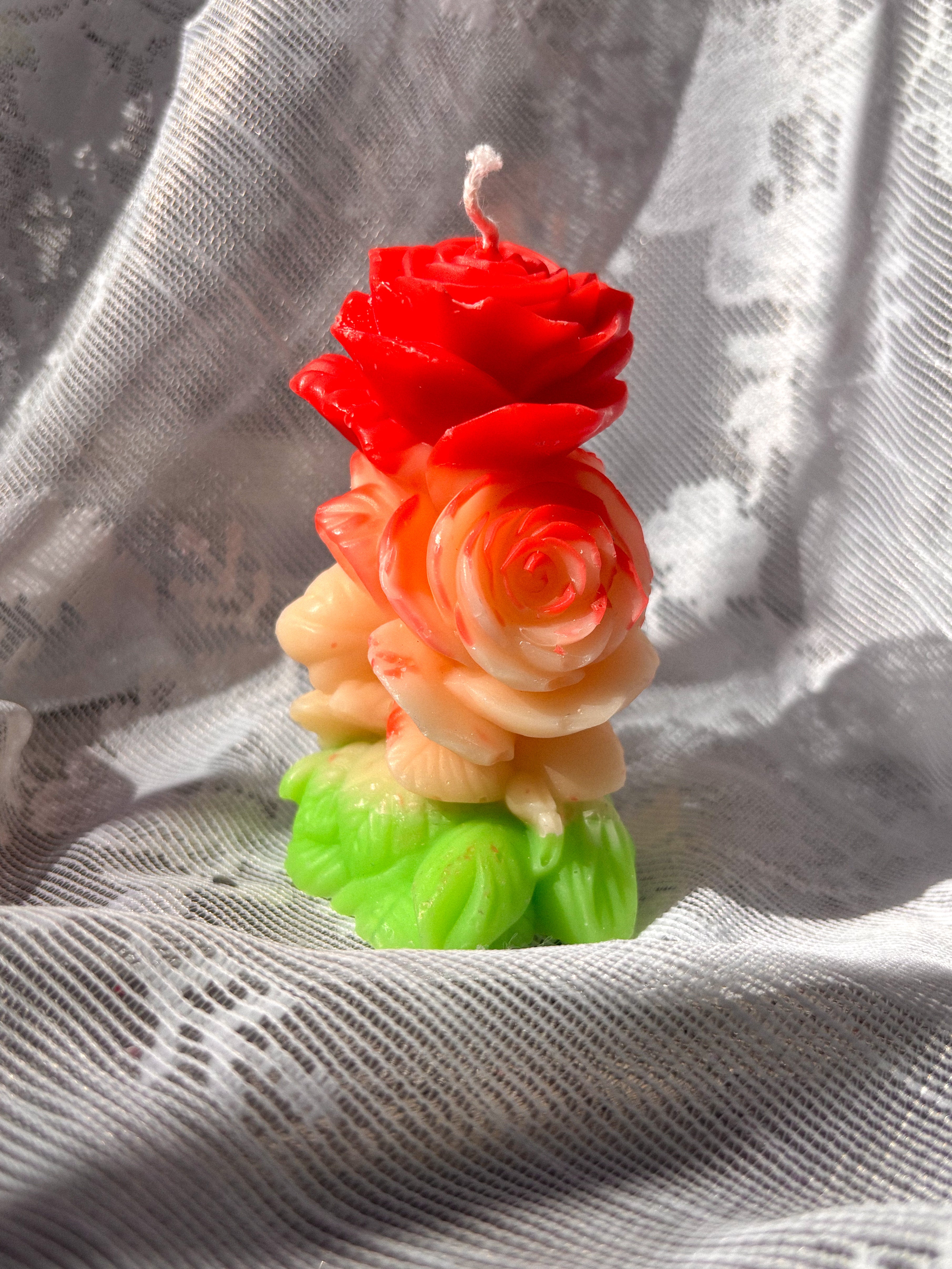 Sculpted rose pillar market candles