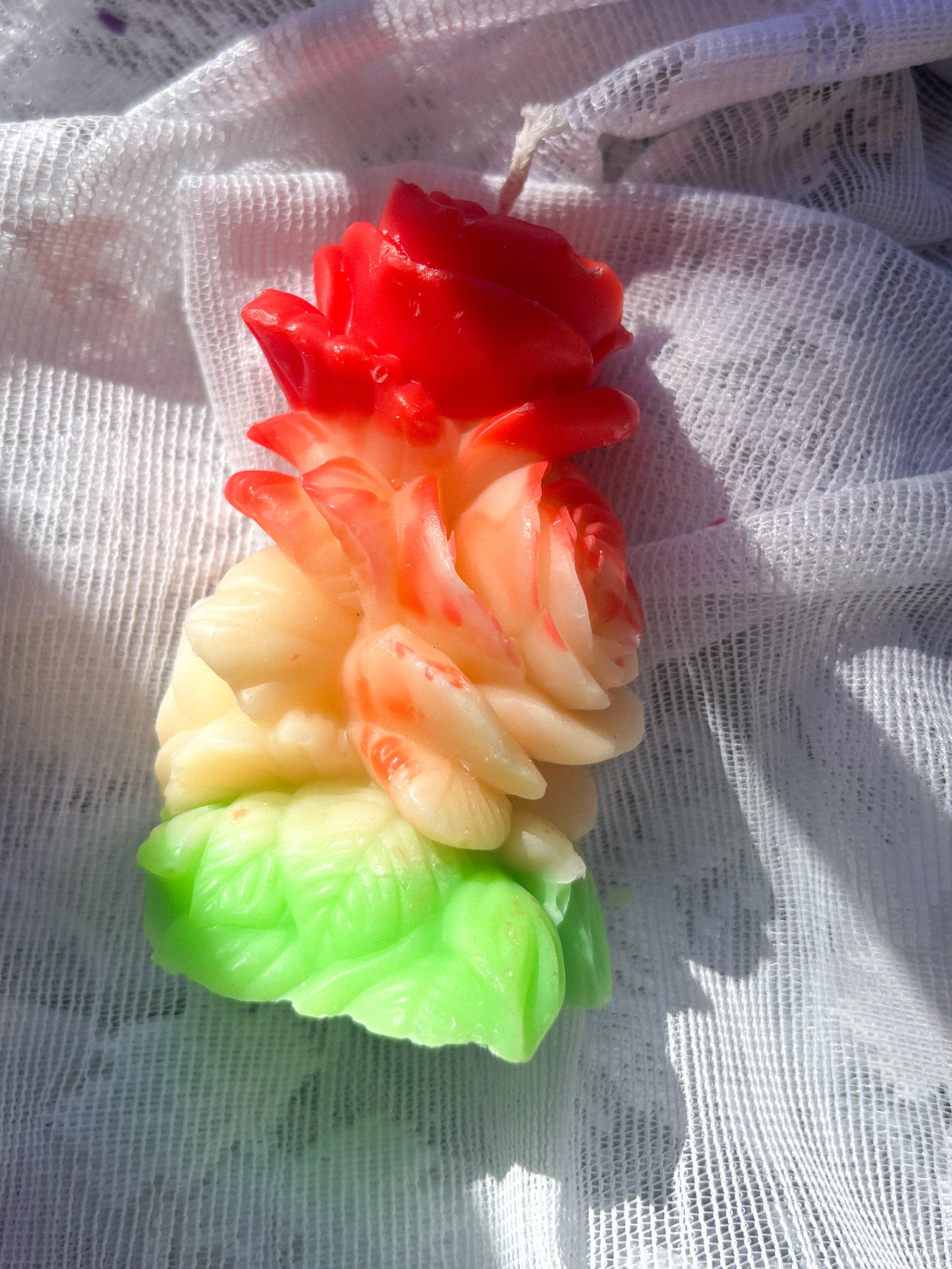 Sculpted rose pillar market candles