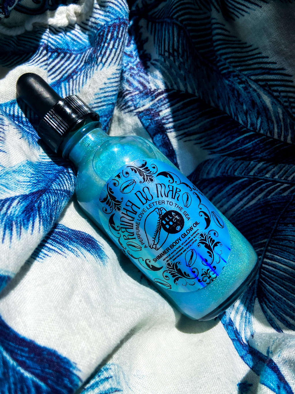 Brazilian beauty | @shop_beladoce | Rainha do mar Queen of the sea | Beladoce botanicals blue shimmer oil | Latina entrepreneurs | Latina owned skincare | Latina skincare | small batch skincare | natural  Brazilian skincare | organic Brazilian skincare | brazilian shimmer oil | glow oil | clean formula | Brazilian cream for sensitive skin | plant based skincare  