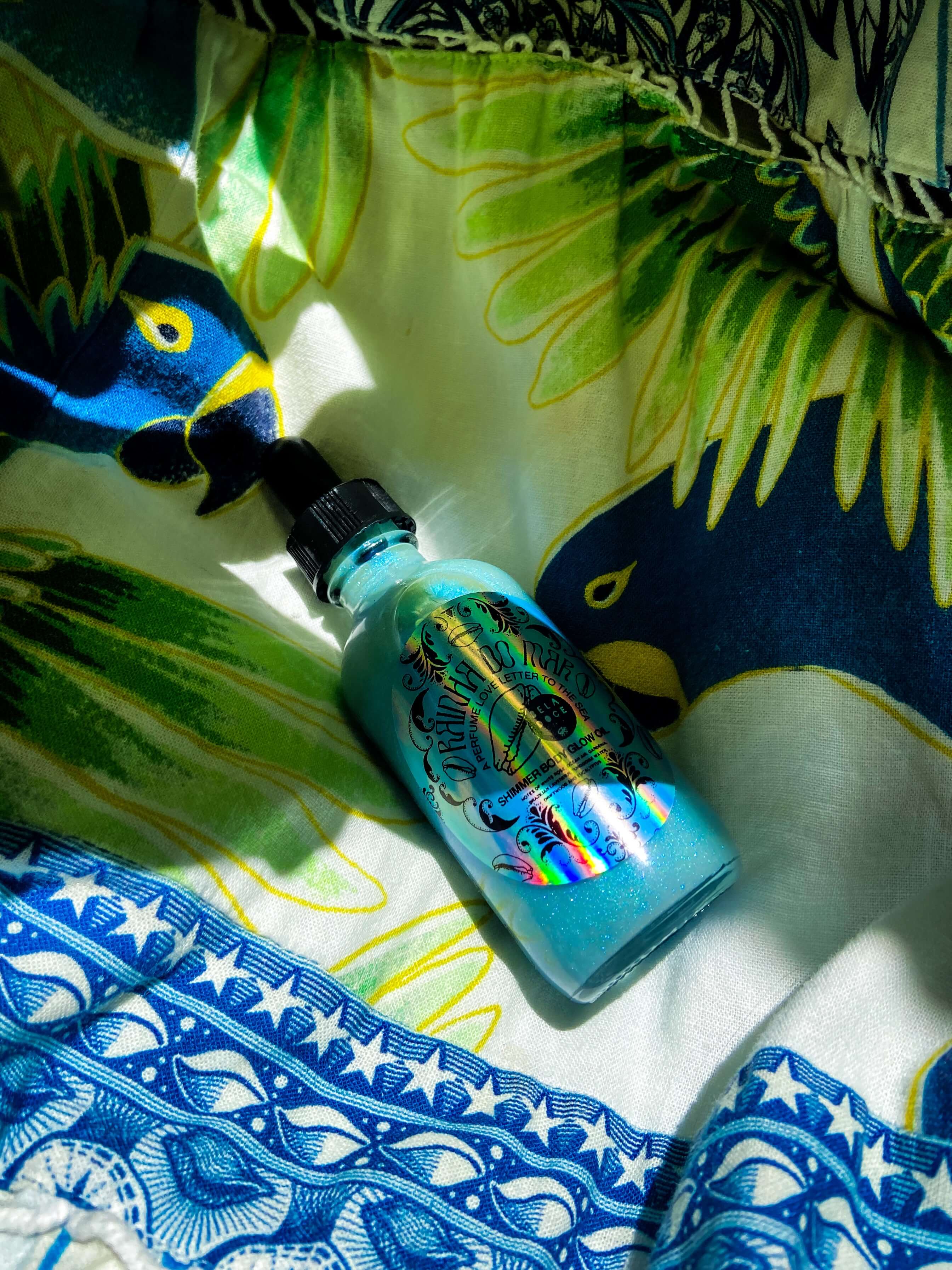 Brazilian beauty | @shop_beladoce | Rainha do mar Queen of the sea | Beladoce botanicals blue shimmer oil | Latina entrepreneurs | Latina owned skincare | Latina skincare | small batch skincare | natural  Brazilian skincare | organic Brazilian skincare | brazilian shimmer oil | glow oil | clean formula | Brazilian cream for sensitive skin | plant based skincare  