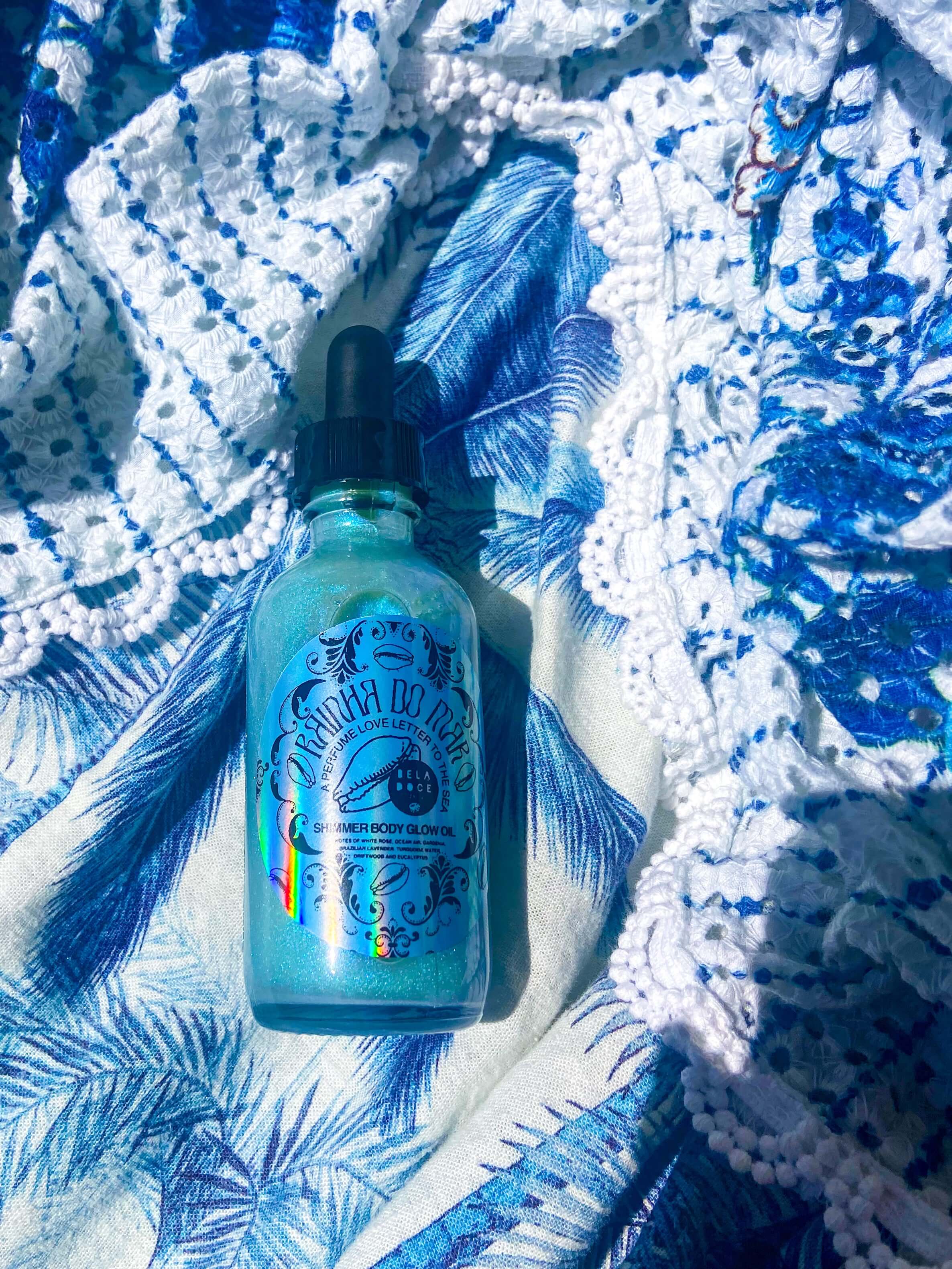 Brazilian beauty | @shop_beladoce | Rainha do mar Queen of the sea | Beladoce botanicals blue shimmer oil | Latina entrepreneurs | Latina owned skincare | Latina skincare | small batch skincare | natural  Brazilian skincare | organic Brazilian skincare | brazilian shimmer oil | glow oil | clean formula | Brazilian cream for sensitive skin | plant based skincare  