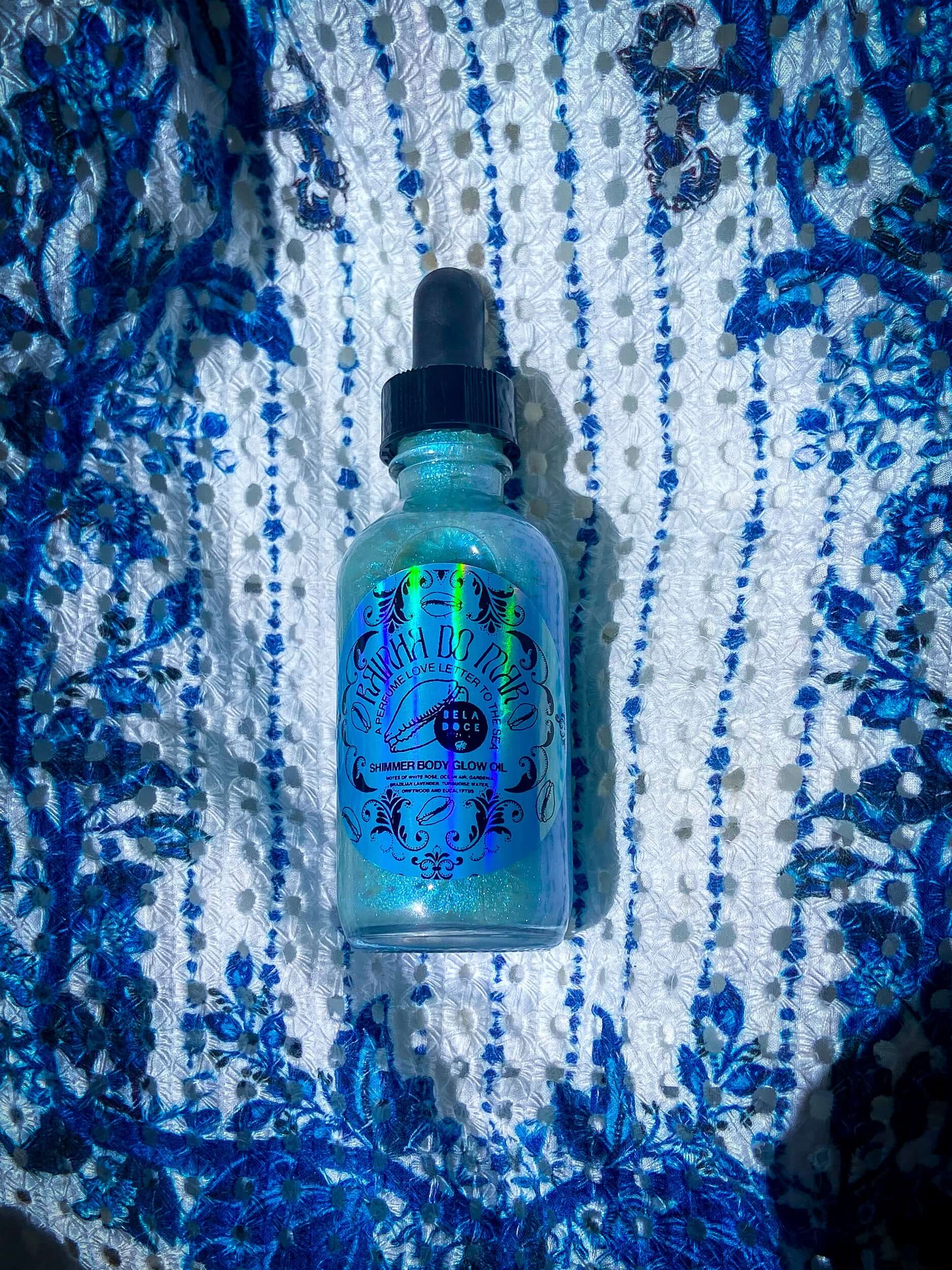 Brazilian beauty | @shop_beladoce | Rainha do mar Queen of the sea | Beladoce botanicals blue shimmer oil | Latina entrepreneurs | Latina owned skincare | Latina skincare | small batch skincare | natural  Brazilian skincare | organic Brazilian skincare | brazilian shimmer oil | glow oil | clean formula | Brazilian cream for sensitive skin | plant based skincare  