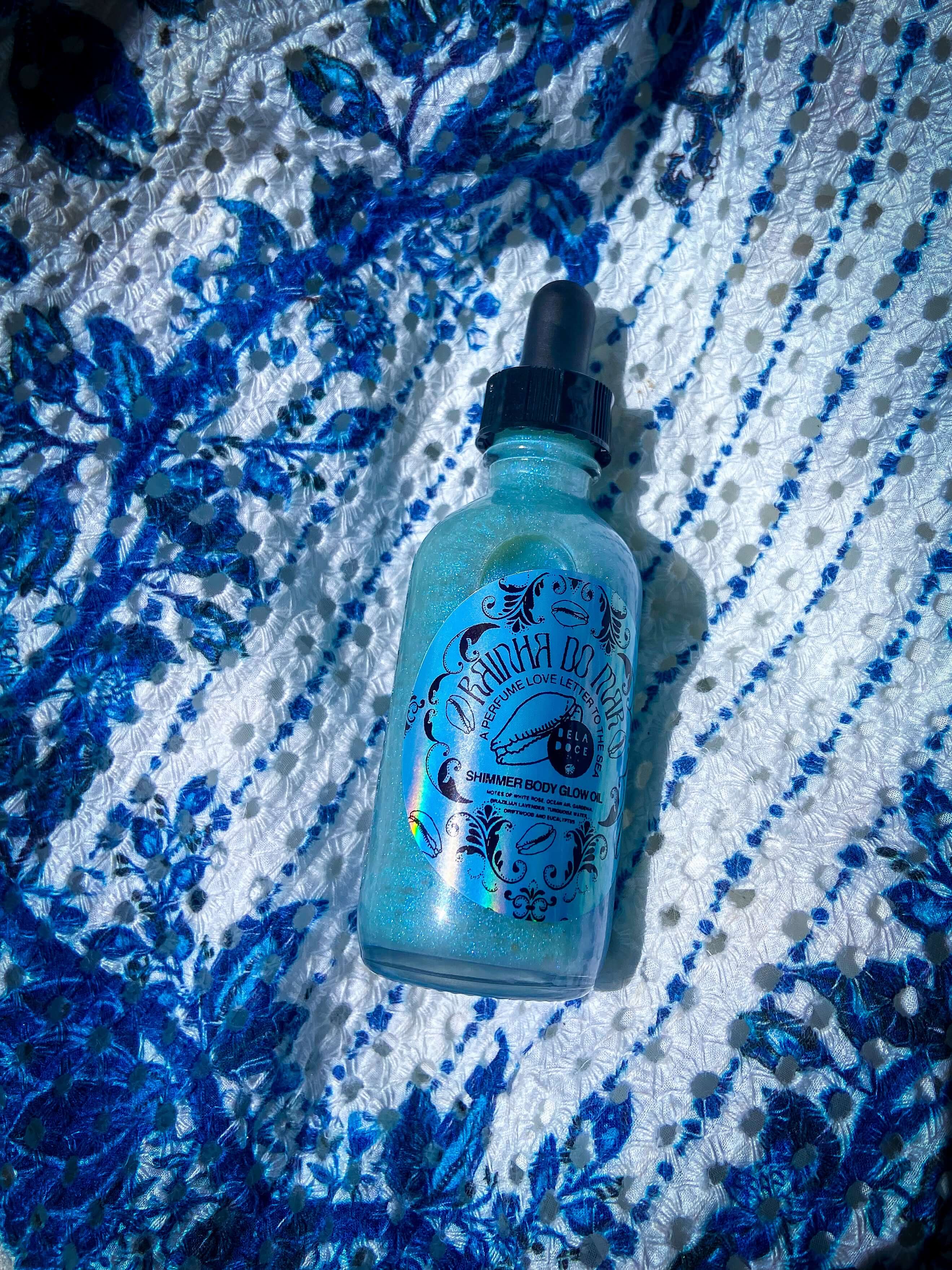 Brazilian beauty | @shop_beladoce | Rainha do mar Queen of the sea | Beladoce botanicals blue shimmer oil | Latina entrepreneurs | Latina owned skincare | Latina skincare | small batch skincare | natural  Brazilian skincare | organic Brazilian skincare | brazilian shimmer oil | glow oil | clean formula | Brazilian cream for sensitive skin | plant based skincare  